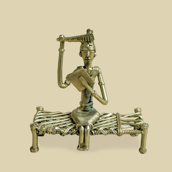 Sitting woman combing her hair